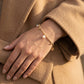 Gabriel & Co. 14K Yellow Gold Bujukan Beads and Pearl Droplet Bracelet - worn lifestyle photo