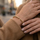 Gabriel & Co. 14K Yellow Gold Bujukan Open Bangle SZ 6.25 - worn lifestyle photo