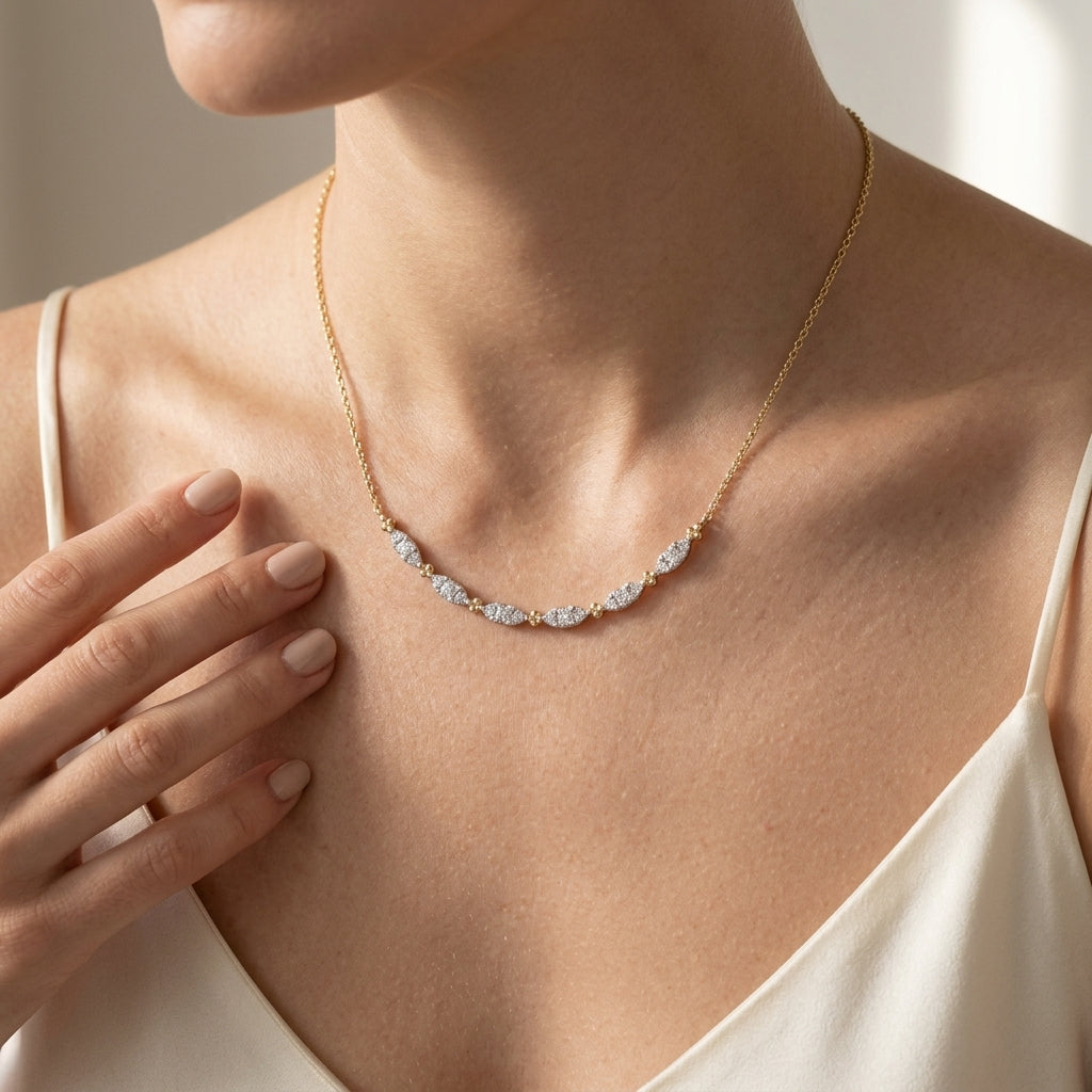 Gabriel & Co. 14K Yellow Gold Curved Bujukan Bar Diamond Necklace 1/3CTW - worn lifestyle photo