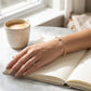 Gabriel & Co. 14K Yellow Gold Bujukan Diamond Teardrops Bangle SZ 6 1/3CTW - worn lifestyle photo