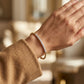 Gabriel & Co. 14K Yellow Gold Bujukan Diamond Bar Split Bangle SZ6.25 .34CTW - worn lifestyle photo