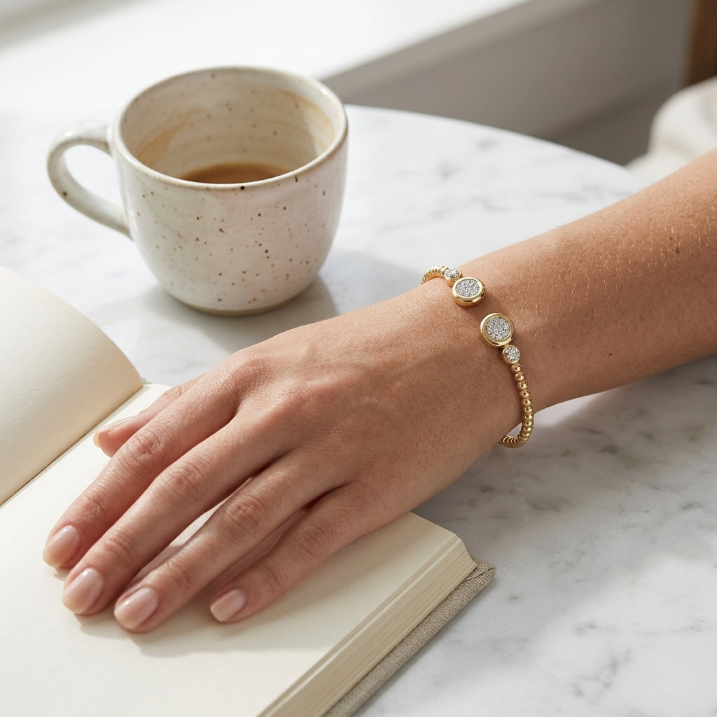 Gabriel & Co. 14K White and Yellow Gold Diamond Bujukan Bangle .25CTW 5.75IN - worn lifestyle photo