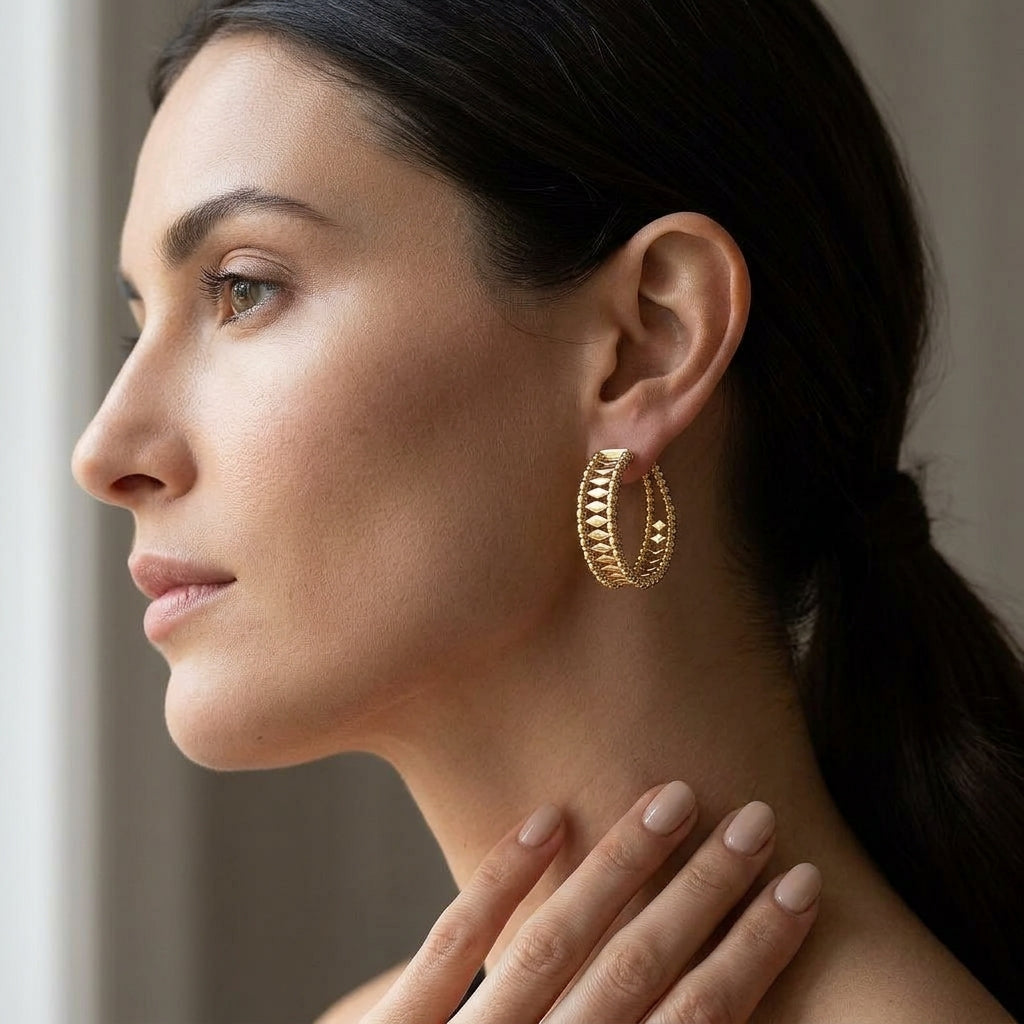 Gabriel & Co. 14K Yellow Gold Bujukan Classic Hoop Earrings in 30mm - worn lifestyle photo