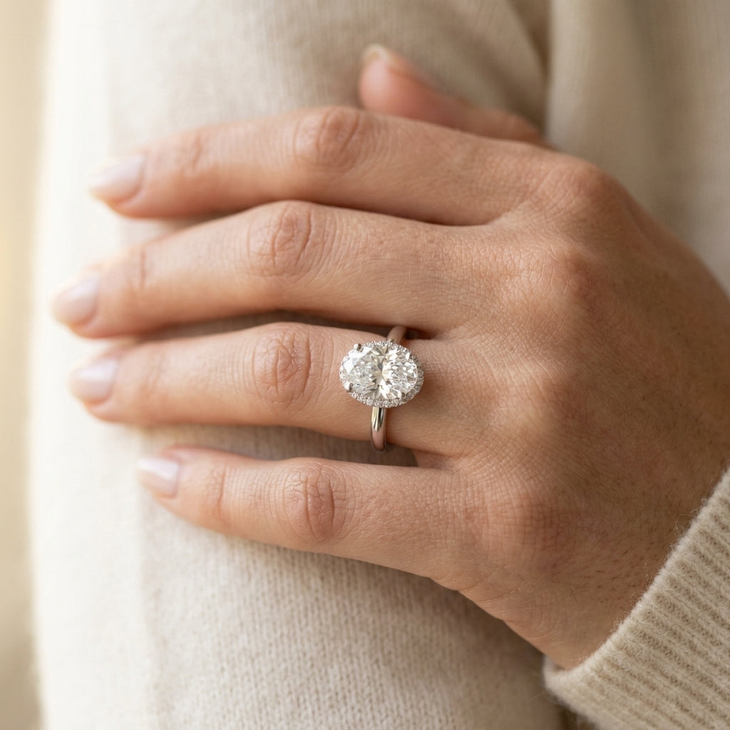 Hidden Halo Oval Engagement Ring - worn lifestyle photo
