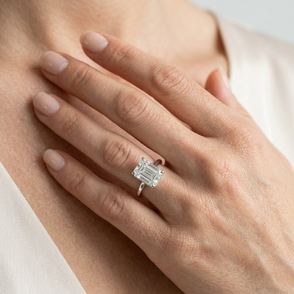 Hidden Halo Emerald Cut Engagement Ring - worn lifestyle photo