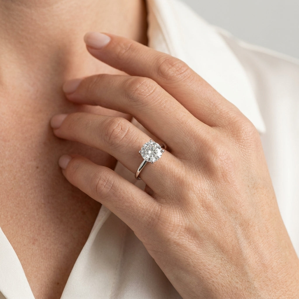 Round Tulip Hidden Halo Engagement Ring - worn lifestyle photo