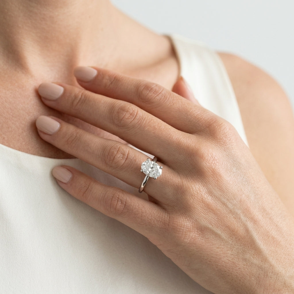 Solitaire Oval Engagement Ring - worn lifestyle photo