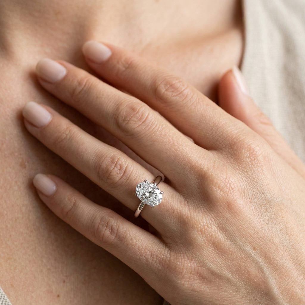 Solitaire Oval Engagement Ring - worn lifestyle photo