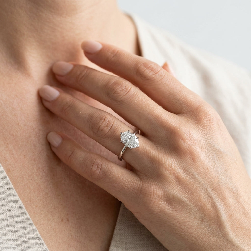 6-Prong Oval Solitaire Engagement Ring - worn lifestyle photo