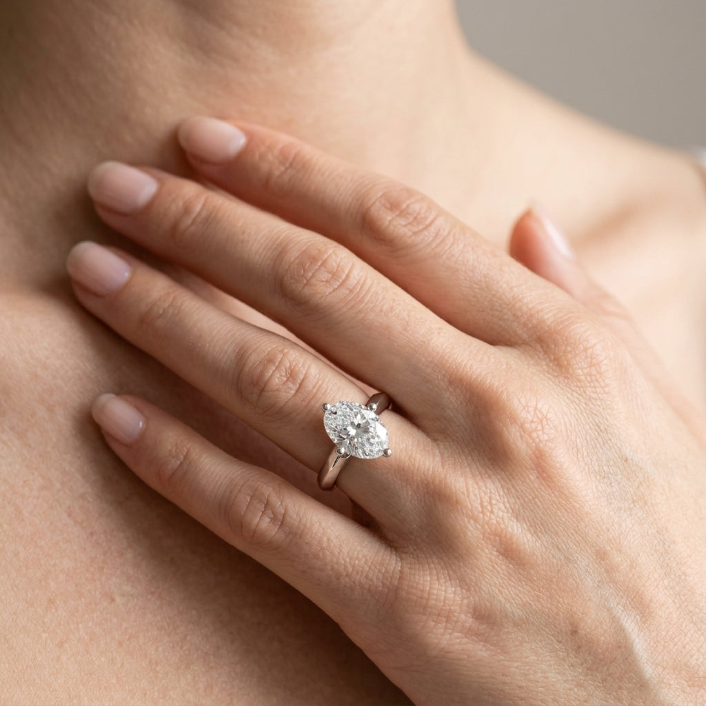 Solitaire Knife Edge Oval Engagement Ring - worn lifestyle photo