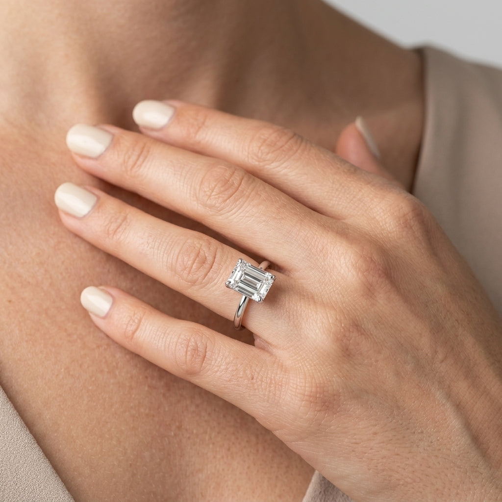 Solitaire Emerald Cut Engagement Ring - worn lifestyle photo