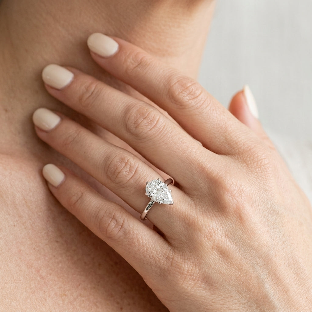 Pear Shape Tulip Solitaire Engagement Ring - worn lifestyle photo