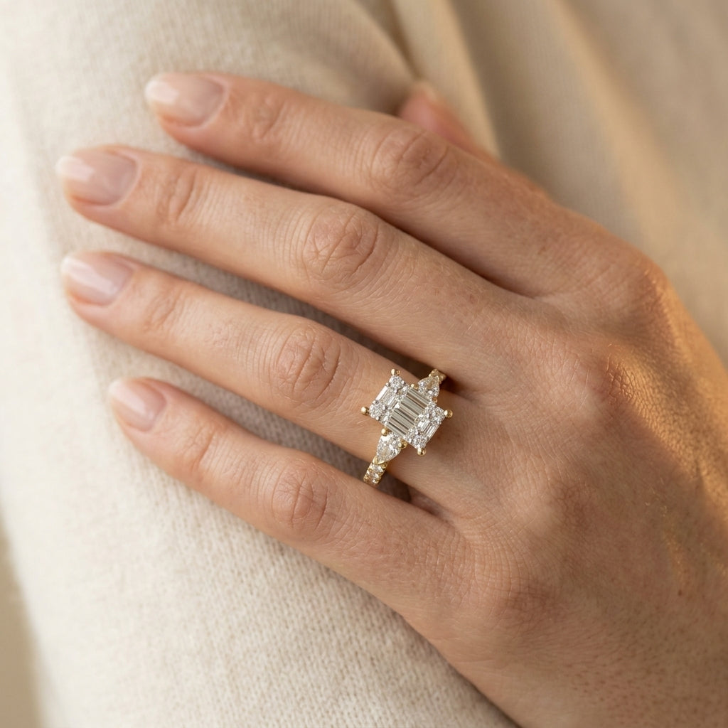 3/4 Ctw Emerald Shape Baguette, Pear and Round Cut Diamond Fusion Engagement Ring in 14K Yellow and White Gold - worn lifestyle photo