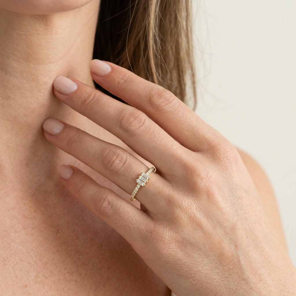 1/5 Ctw Baguette and Round Cut Diamond Petite Fashion Ring in 10K Yellow Gold - worn lifestyle photo