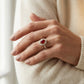7X5 MM Oval Cut Ruby & 5/8 Ctw Baguette and Round Cut Diamond Halo Precious Ring in 14K Yellow Gold - worn lifestyle photo