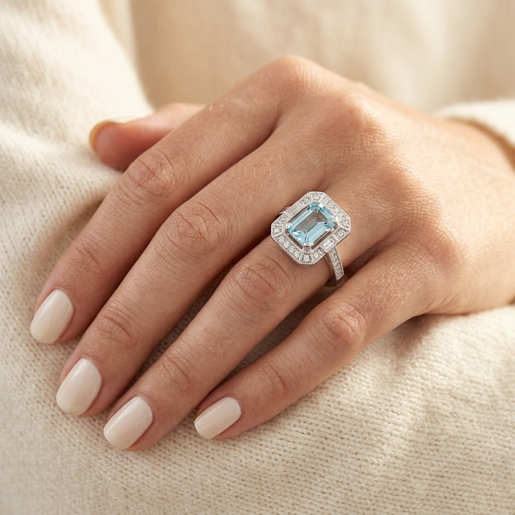 1/5 Ctw Emerald Shape 7X5 MM Aquamarine, Baguette and Round Cut Diamond Precious Ring in 14K White Gold - worn lifestyle photo