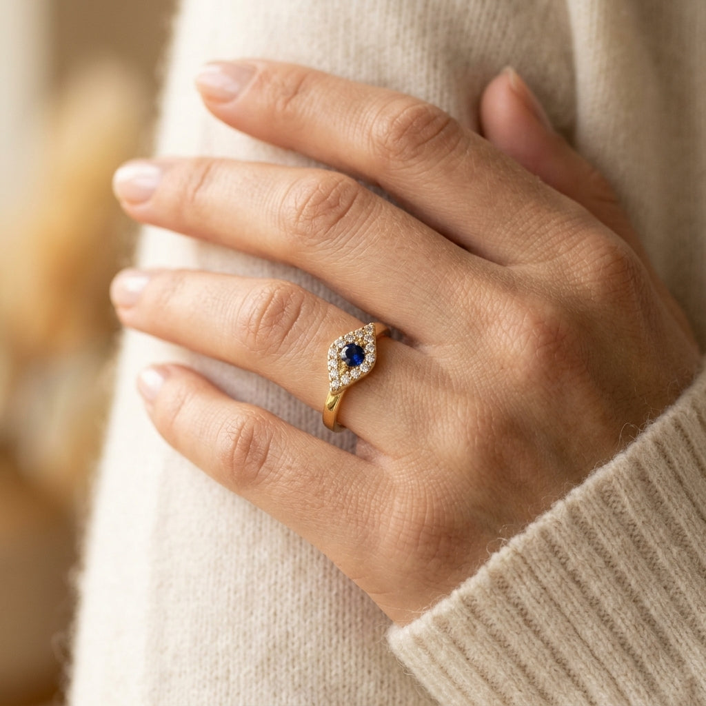 2.60 MM Round Shape Sapphire and 1/10 Ctw Evil Eye Petite Round Cut Diamond Precious Ring in 10K Yellow Gold - worn lifestyle photo