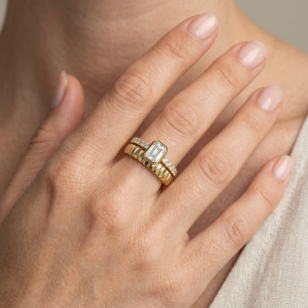 1/2 Ctw Split Twin Row Bezel Set Emerald and Round Cut Diamond Fashion Ring in 14K Yellow Gold - worn lifestyle photo