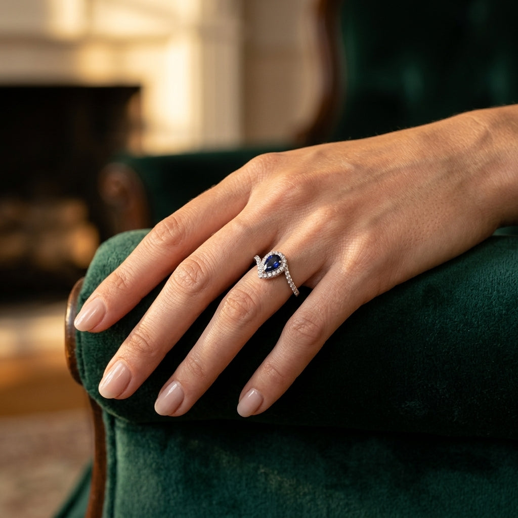 6X4 MM Pear Shape Sapphire and 1/5 Ctw Round Cut Diamond Precious Ring in 10K White Gold - worn lifestyle photo
