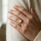 7 MM Cultured Pearl and 1/10 Ctw Round Cut Diamond Criss Cross Fashion Ring in 10K Yellow Gold - worn lifestyle photo