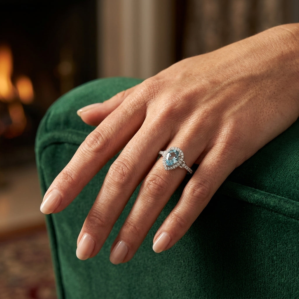 7X5 MM Pear Shape Aquamarine and 1/6 Ctw Round Cut Diamond Ring in 10K White Gold - worn lifestyle photo