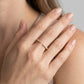 1/5 Ctw Graduated Round Cut Diamond Claw Open Fashion Ring in 10K Yellow Gold - worn lifestyle photo