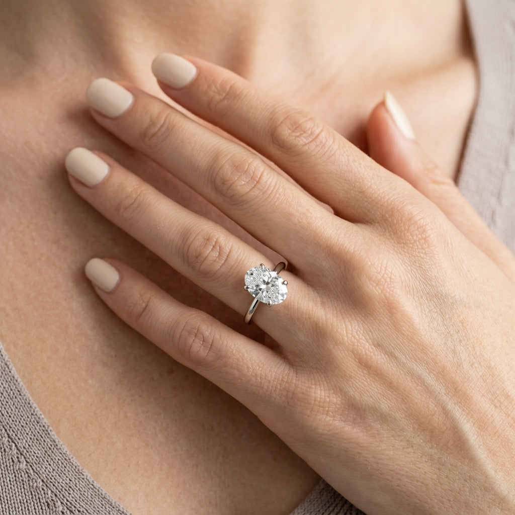 Oval Tulip Solitaire Engagement Ring - worn lifestyle photo