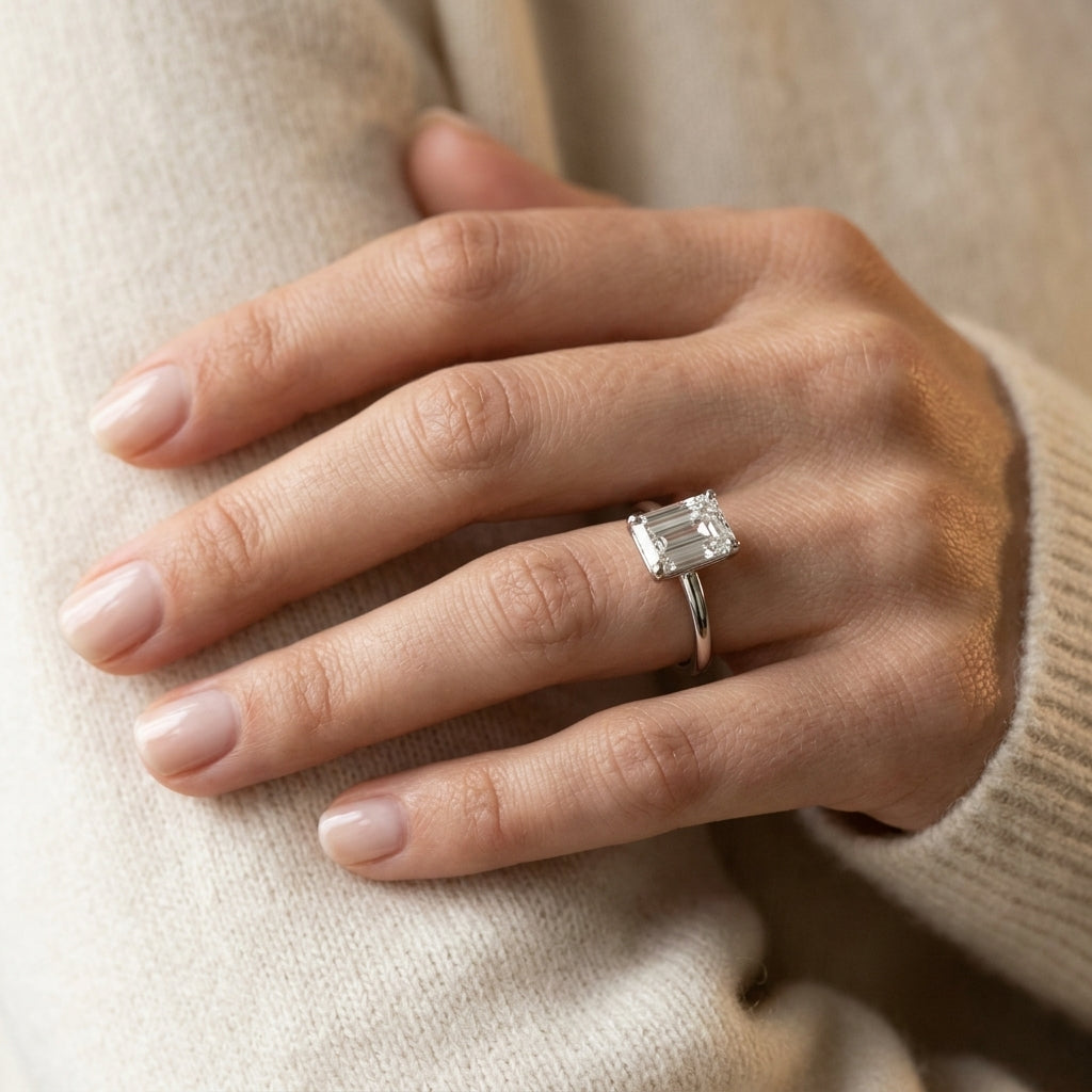Solitaire Emerald Cut Engagement Ring - worn lifestyle photo