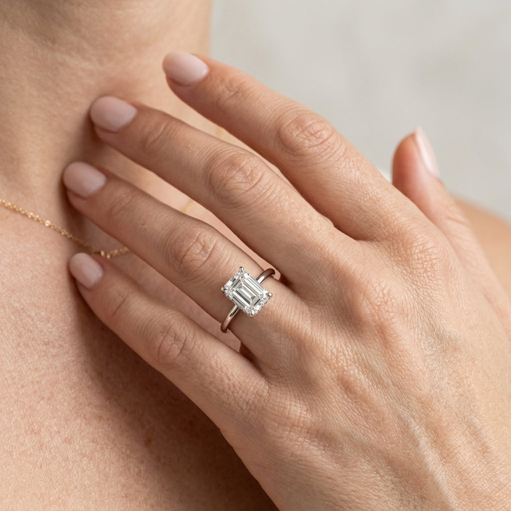 Hidden Halo Emerald Cut Engagement Ring - worn lifestyle photo