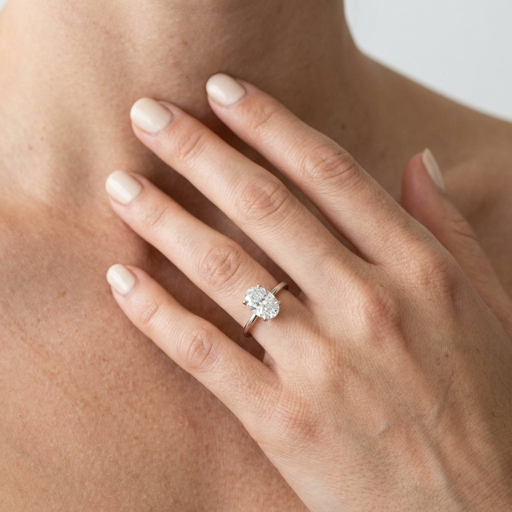 Hidden Halo Oval Engagement Ring - worn lifestyle photo