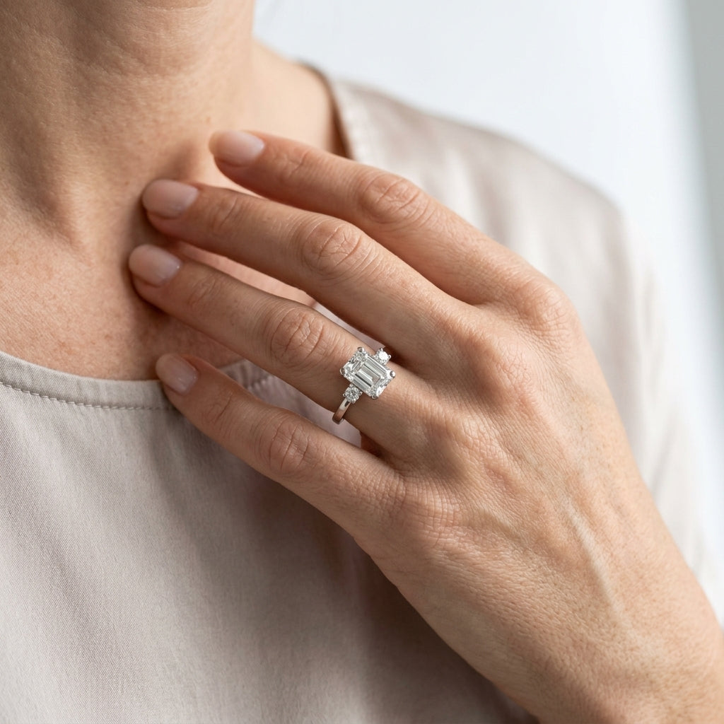 3-Stone Emerald Cut Engagement Ring - worn lifestyle photo