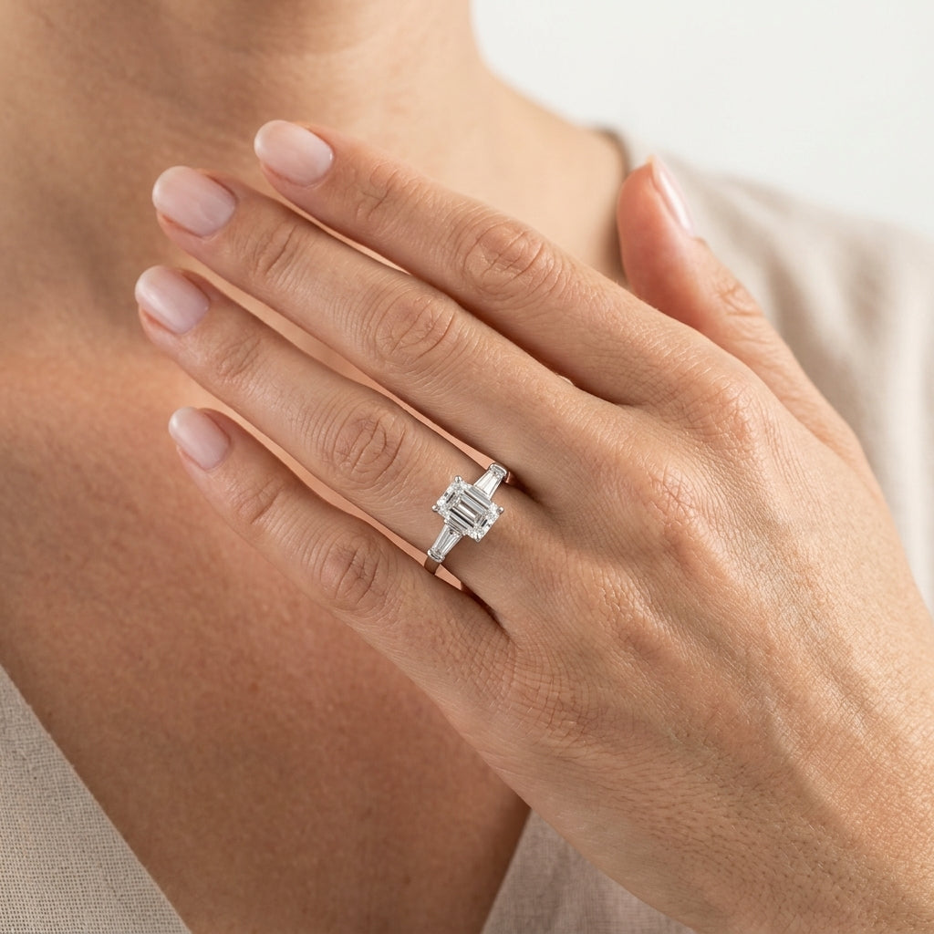 Tapered Baguette 3-Stone Emerald Cut Engagement Ring - worn lifestyle photo