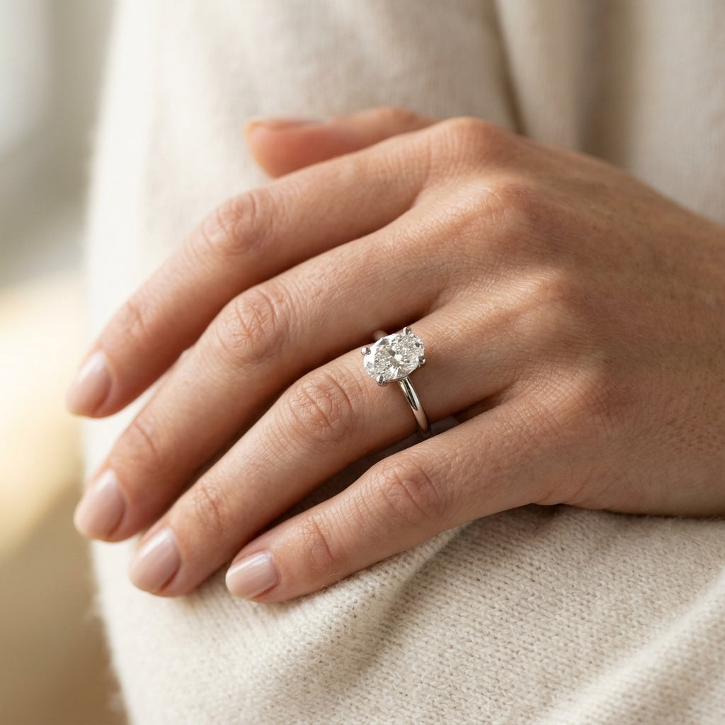 Solitaire Oval Engagement Ring - worn lifestyle photo