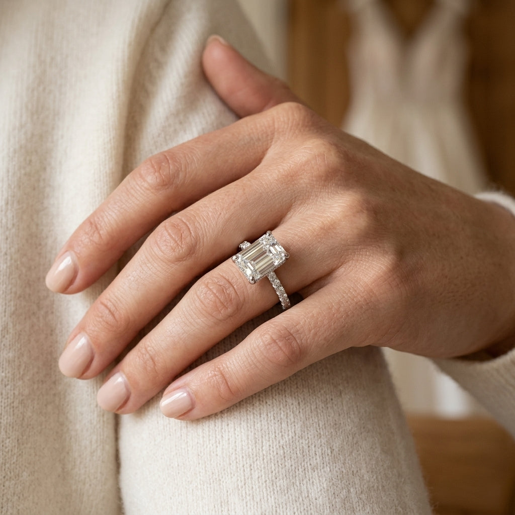 Prong Set Emerald Cut Hidden Halo Engagement Ring - worn lifestyle photo