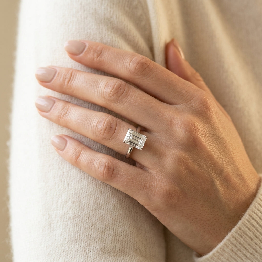 Solitaire Cathedral Emerald-Cut Engagement Ring - worn lifestyle photo