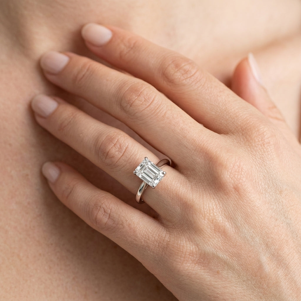 Solitaire Emerald Cut Engagement Ring - worn lifestyle photo