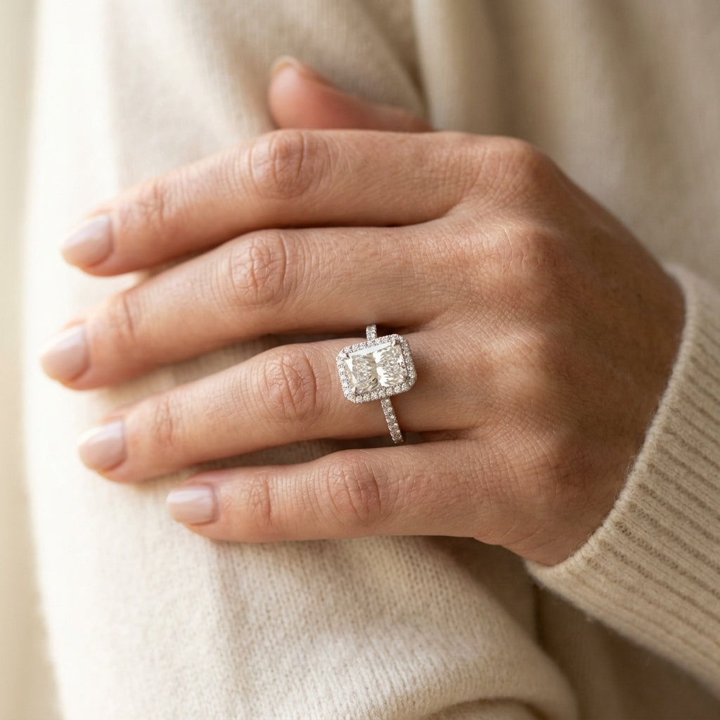 Single Row Emerald Cut Halo Engagement Ring - worn lifestyle photo