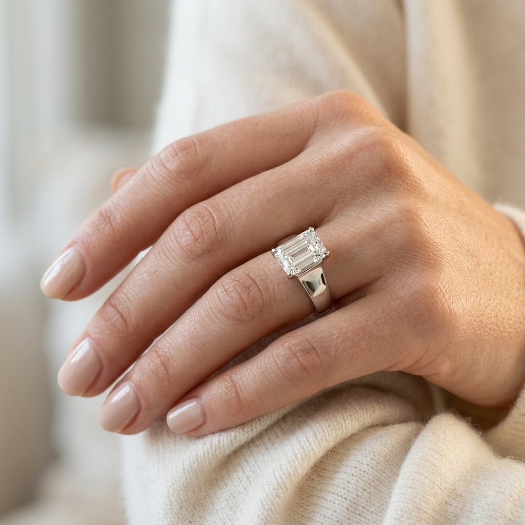 Solitaire Trellis Emerald Cut Engagement Ring - worn lifestyle photo