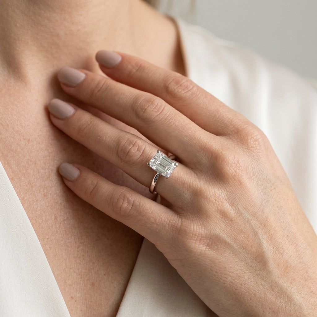 Solitaire Emerald Cut Engagement Ring - worn lifestyle photo