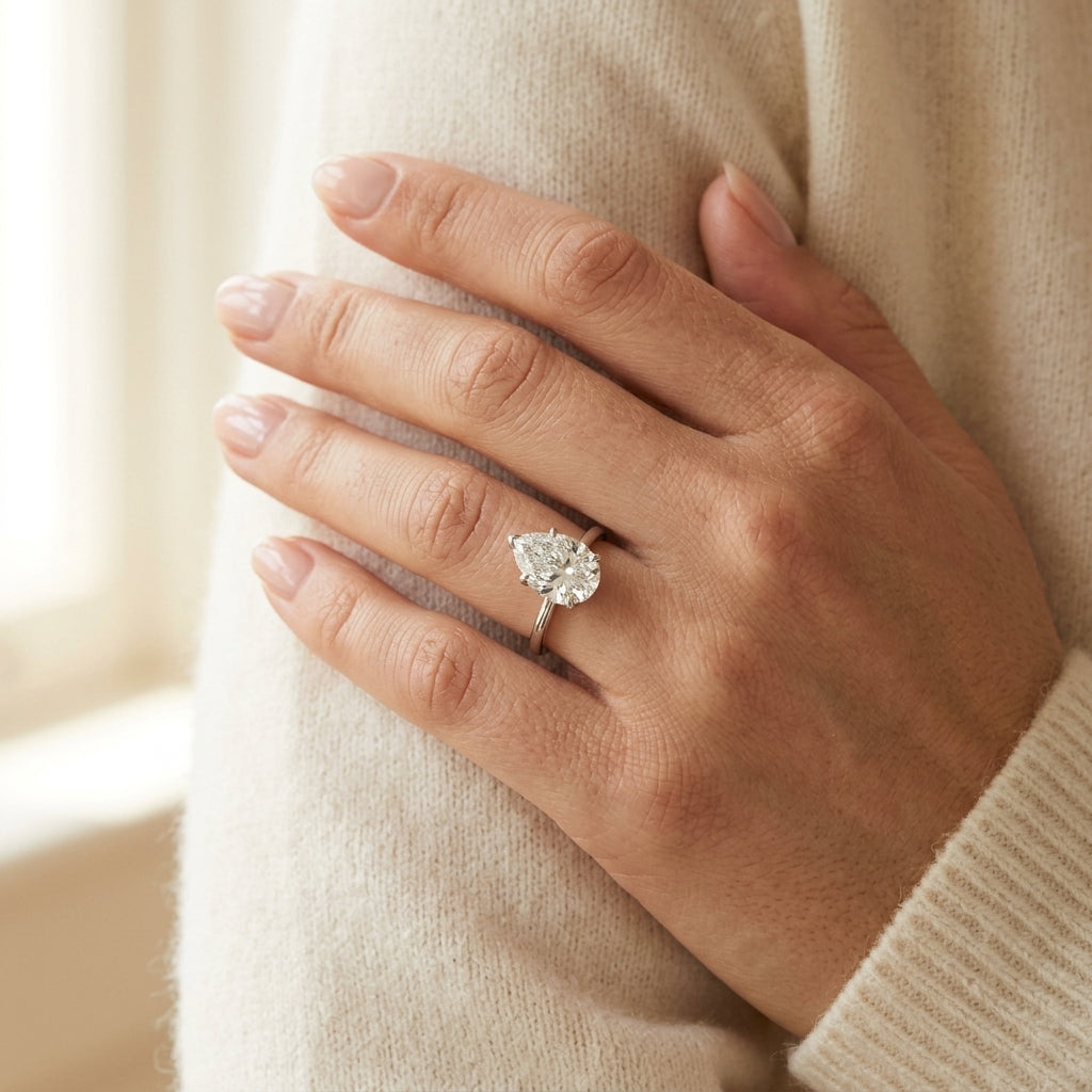 Pear Shape Tulip Solitaire Engagement Ring - worn lifestyle photo