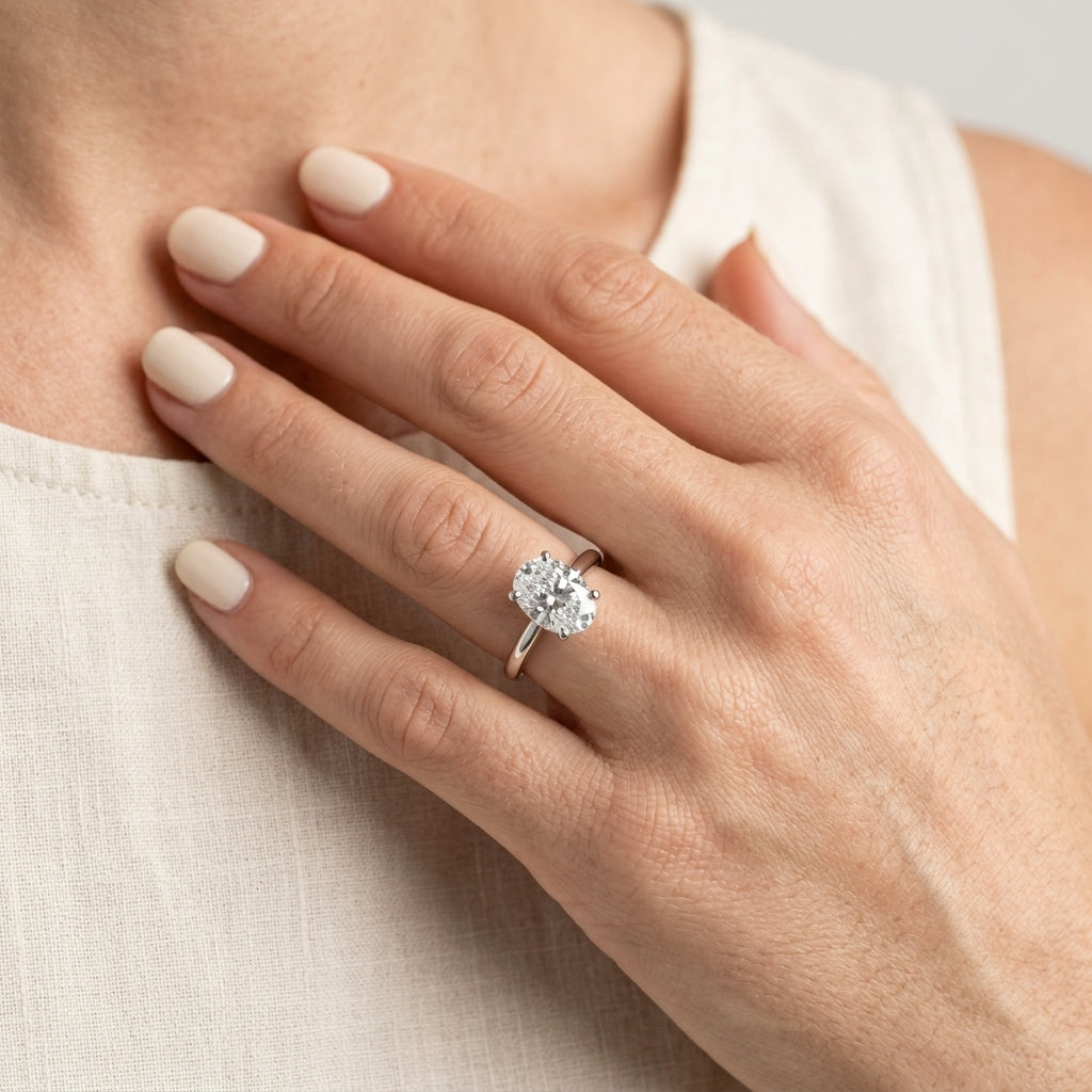 Solitaire Oval Engagement Ring - worn lifestyle photo