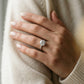 Round Hidden Halo Engagement Ring - worn lifestyle photo