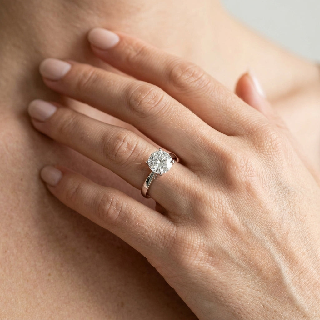4-Prong Cathedral Solitaire Engagement Ring - worn lifestyle photo