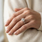 Round Hidden Halo Engagement Ring - worn lifestyle photo