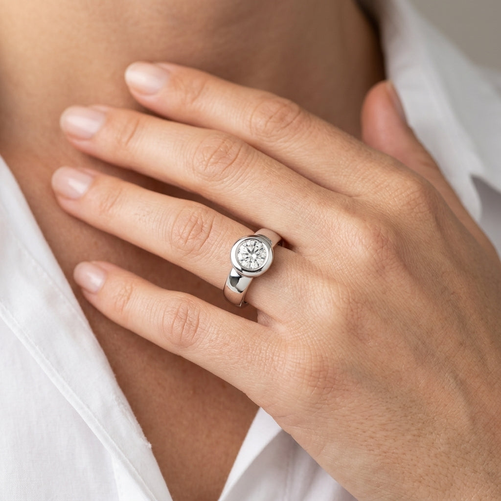 Solitaire Bezel Set Engagement Ring - worn lifestyle photo