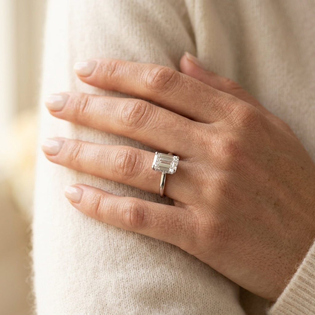 6-Prong Solitaire Emerald Cut Engagement Ring - worn lifestyle photo