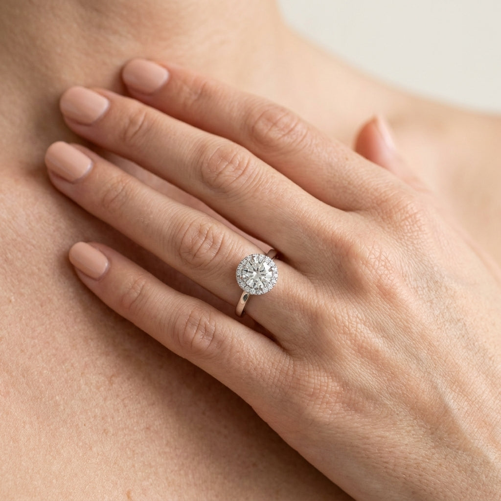 ROUND HALO ENGAGEMENT RING - worn lifestyle photo