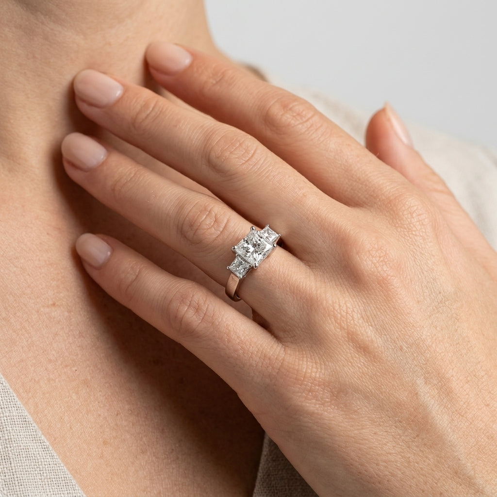 ENGAGEMENT RINGS 3 STONE PRINCESS - worn lifestyle photo