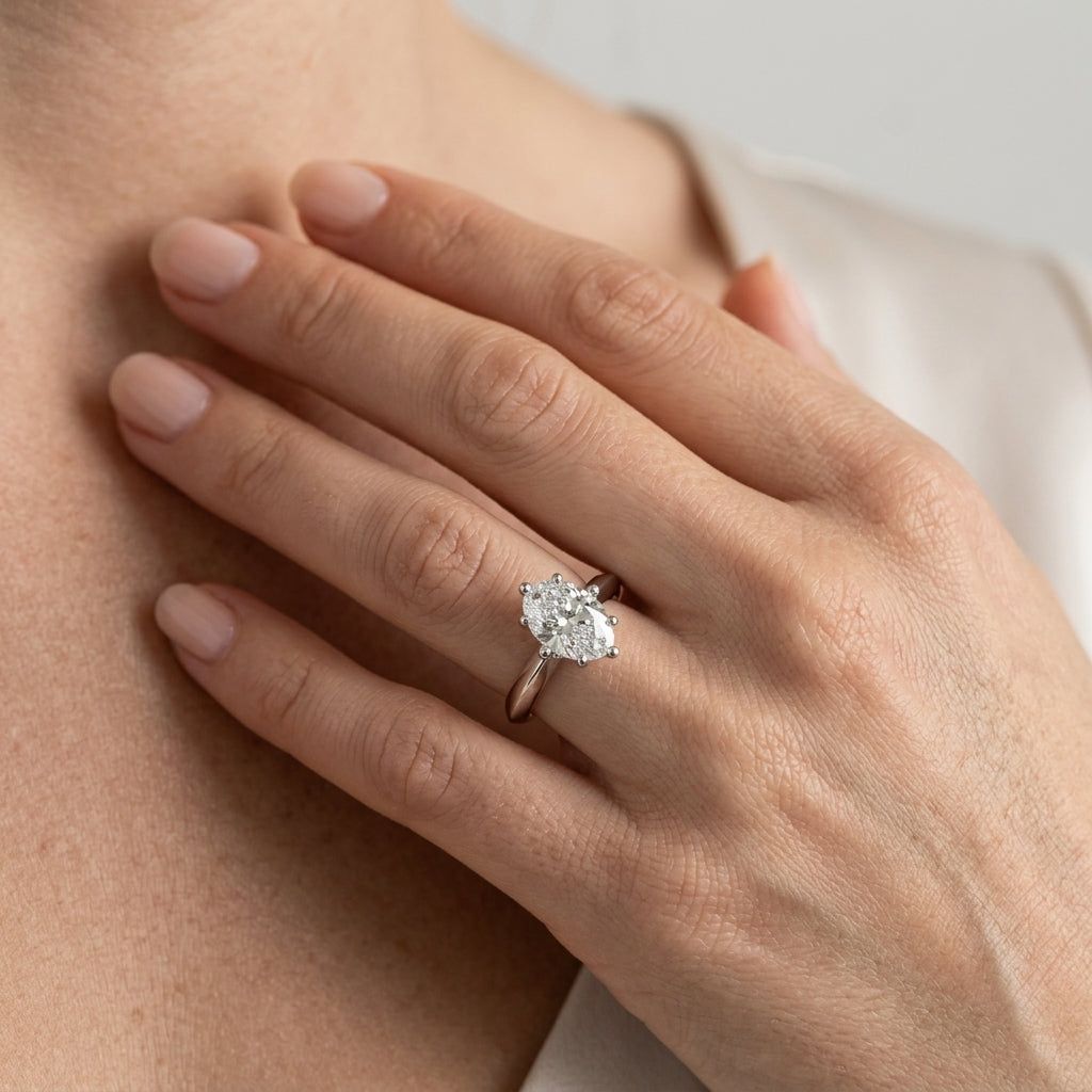 Solitaire Knife Edge Oval Engagement Ring - worn lifestyle photo