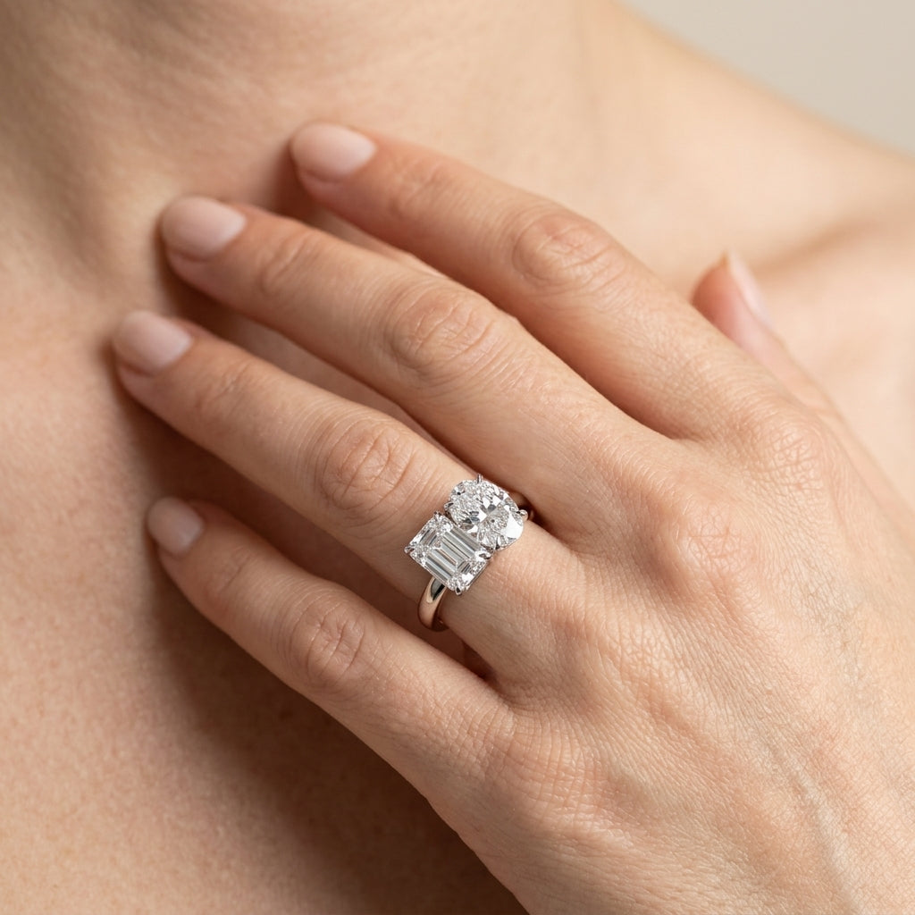 2-Stone Oval & Emerald Engagement Ring - worn lifestyle photo